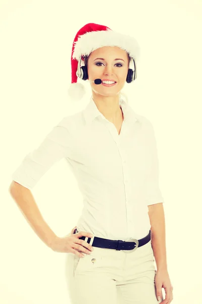 Woman in santa hat, microphone and headphones. — Stock Photo, Image