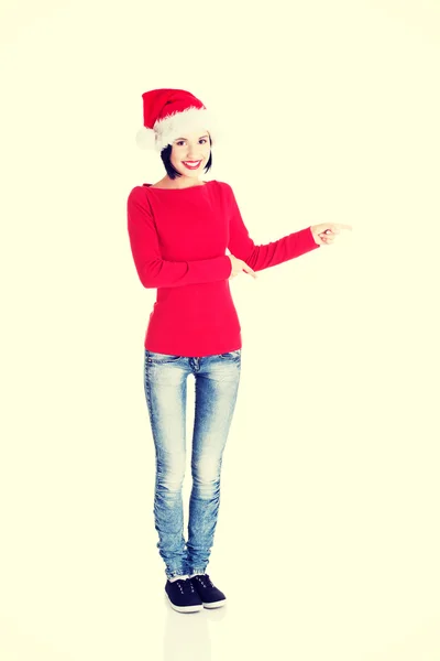 Santa woman pointing on side — Stock Photo, Image