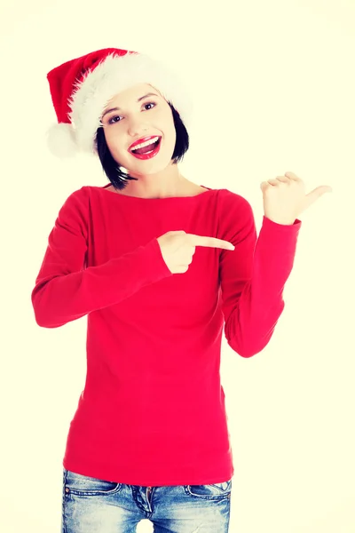 Santa woman pointing on side — Stock Photo, Image