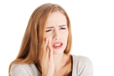 diş ağrısı olan kadın