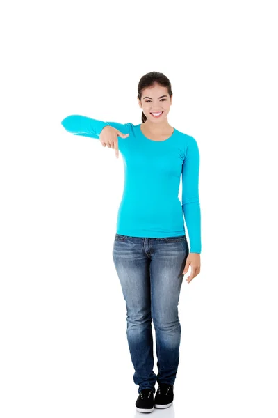 Woman pointing down — Stock Photo, Image