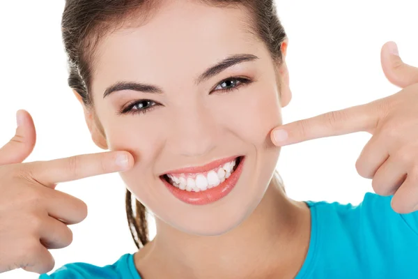 Woman showing her teeth — Stock Photo, Image