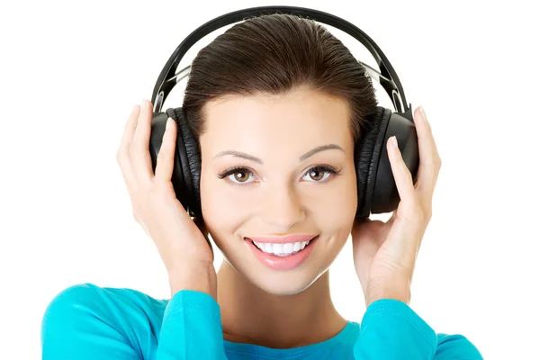 Woman with big headphones — Stock Photo, Image