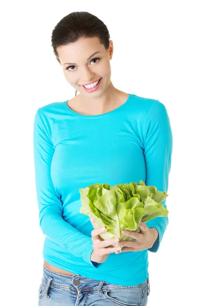 Woman holding lettuce — Stock Photo, Image