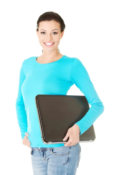 Šťastná žena držící notebook Stock Snímky