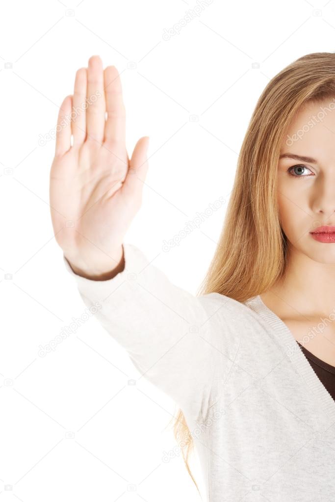 Woman gesturing stop sign