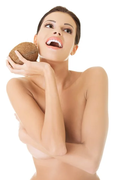 Nagie kobiety uśmiechający się z kokosa — Zdjęcie stockowe