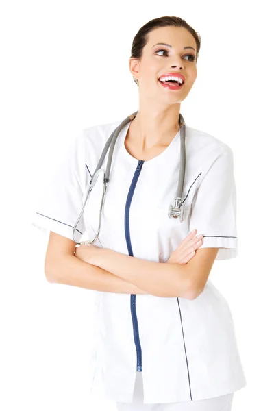 Felice medico femminile con le braccia incrociate — Foto Stock