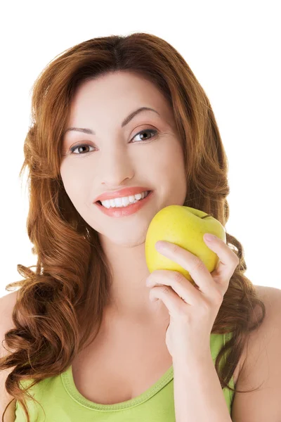 Mulher feliz segurando uma maçã — Fotografia de Stock