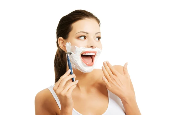 Portrait of happy woman shaving beard — Stock Photo, Image
