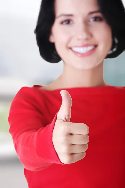 Attractive young student woman gesturing OK — Stock Photo, Image