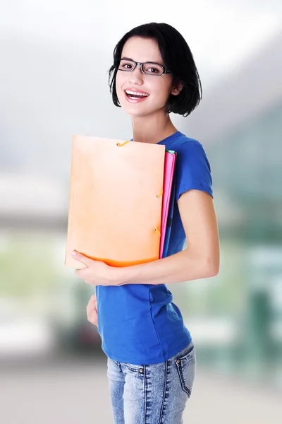 Happy student woman with notebooks — Stock Photo, Image