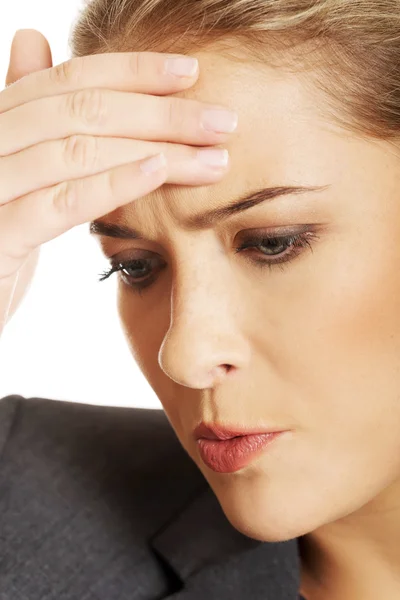 Businesswoman having huge headache — Stock Photo, Image