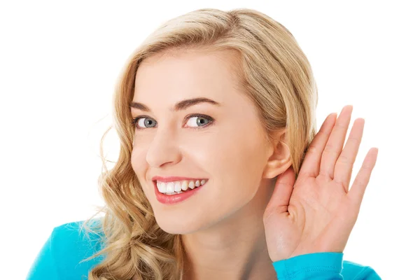 Portrait of woman overhearing a conversation — Stock Photo, Image