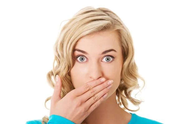 Portrait of a woman covering her mouth Royalty Free Stock Photos