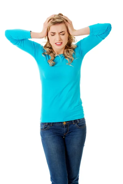 Full length young woman with huge headache — Stock Photo, Image