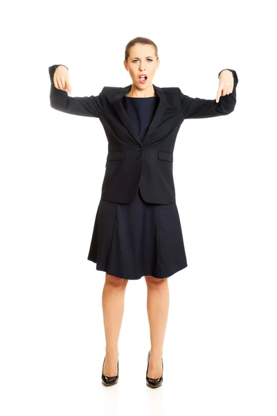 Businesswoman pointing down — Stock Photo, Image