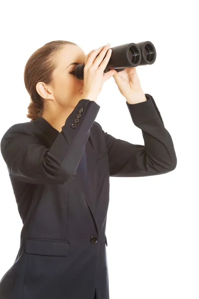 Mujer de negocios con un binocular —  Fotos de Stock