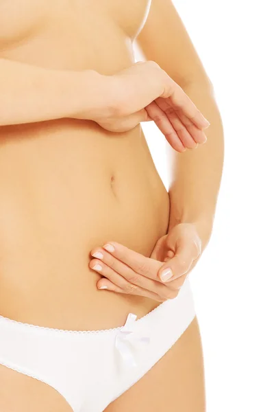 Woman carying about her belly — Stock Photo, Image