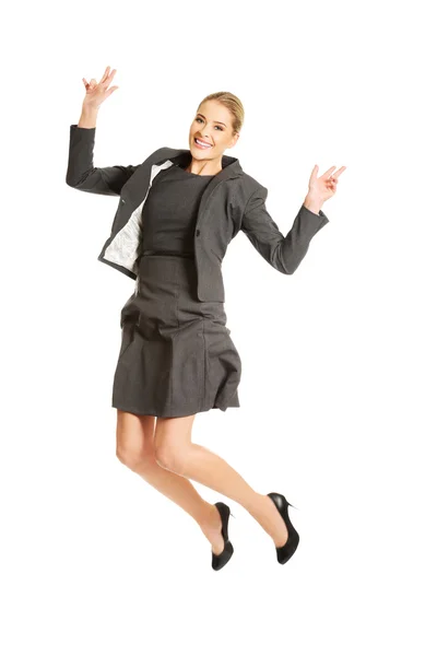 Веселая прыгунья деловая женщина — стоковое фото
