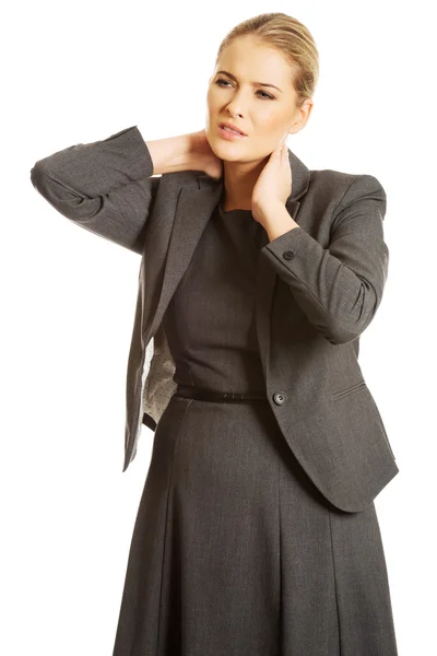 Businesswoman having neck pain — Stock Photo, Image