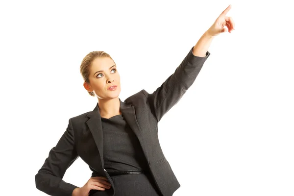 Affärskvinna pekar högt — Stockfoto