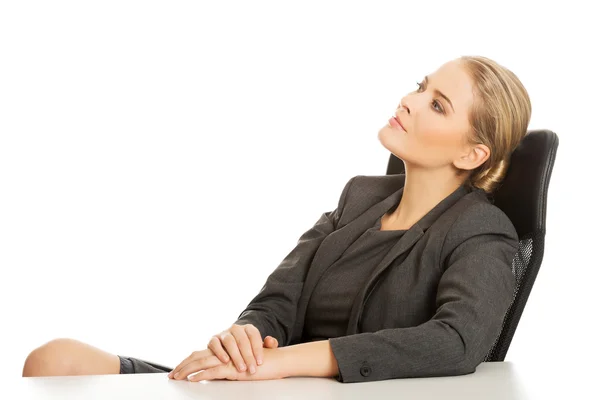 Businesswoman relaxing on armchair — Stock Photo, Image