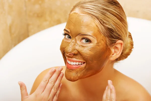 Woman with chocolate mask — Stock Photo, Image