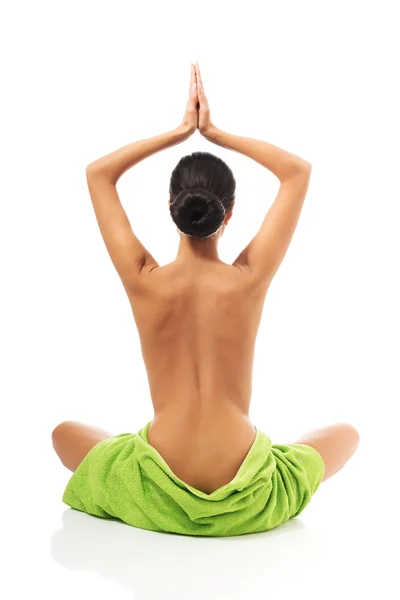 Back view woman sitting excercising yoga — Stock Photo, Image