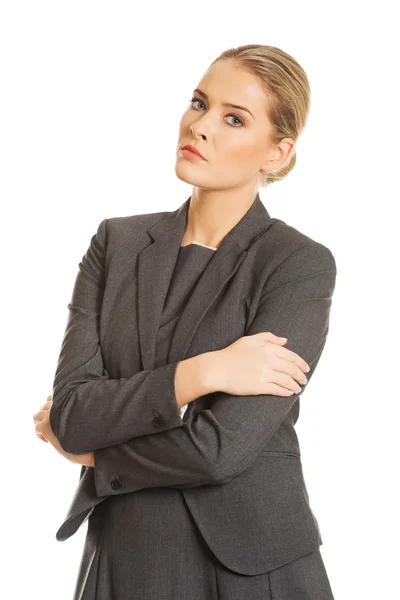 Businesswoman standing in confident pose — Stock Photo, Image