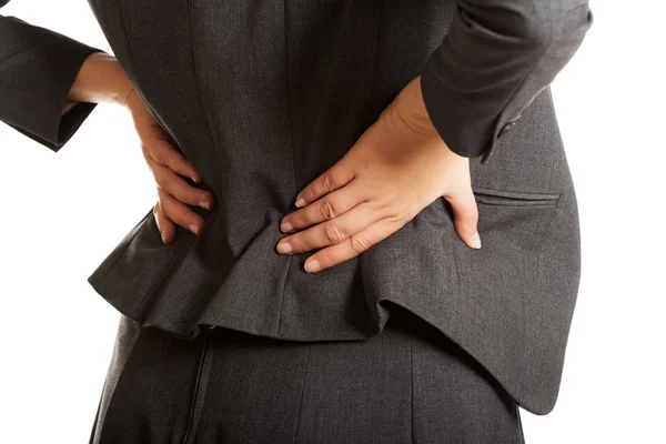 Donna d'affari che ha mal di schiena — Foto Stock