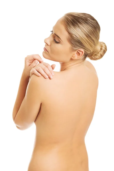 Woman looking at the shoulder — Stock Photo, Image