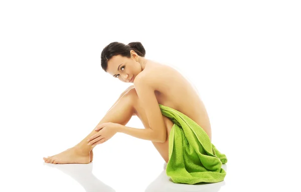 Woman wrapped in towel — Stock Photo, Image