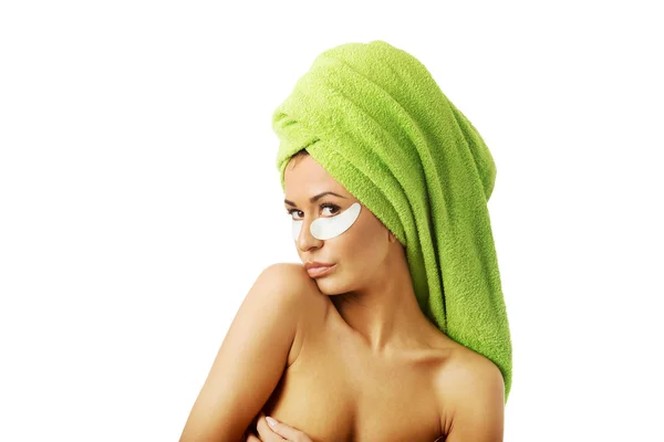 Woman with gel eye mask — Stock Photo, Image