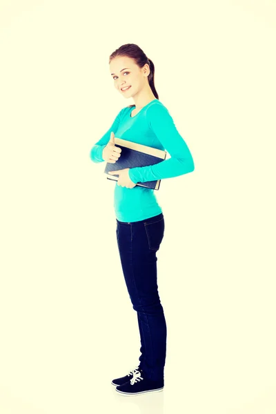 Student woman with book gesturing OK — Stock Photo, Image