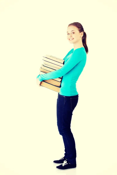 Jovem caucasiana com livros — Fotografia de Stock