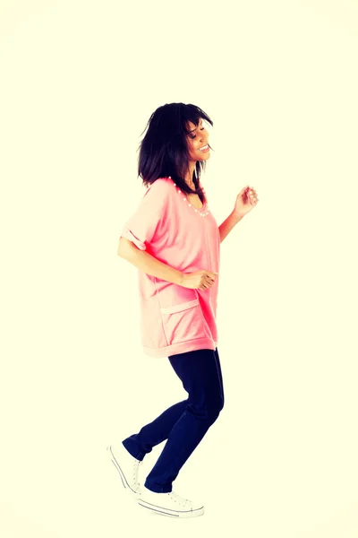 Estudante feliz menina correndo — Fotografia de Stock