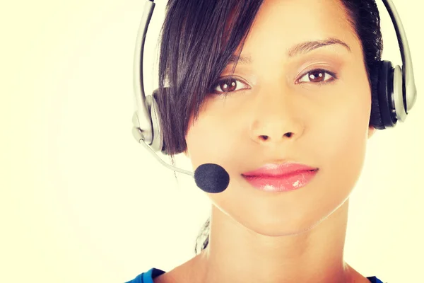 Beautiful young call-center assistant smiling — Stock Photo, Image