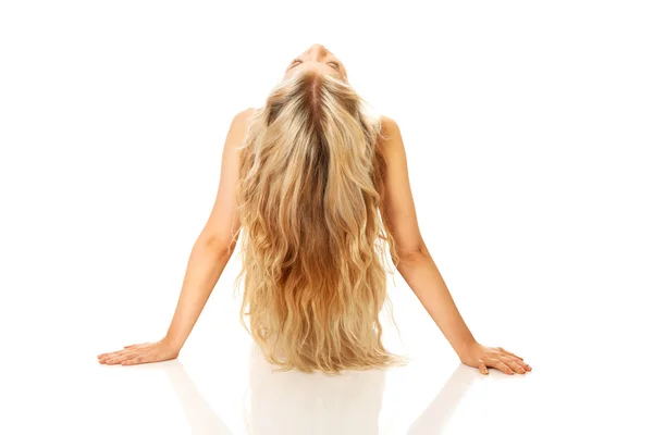 Back view nude woman spreading arms on the floor — Stock Photo, Image