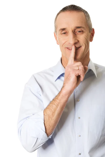 Portrait of a man with silent gesture — Stock Photo, Image