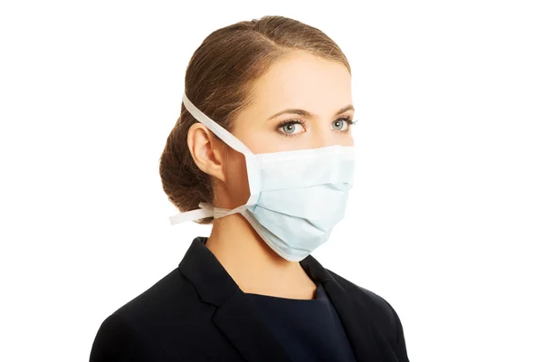Businesswoman with protecting mask — Stock Photo, Image