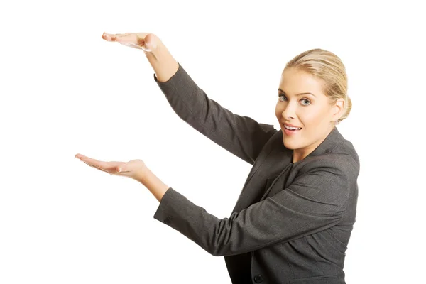 Business woman presenting a copyspace — Stock Photo, Image