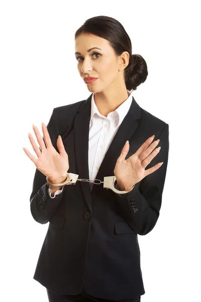 Full length businesswoman with handcuffs — Stock Photo, Image