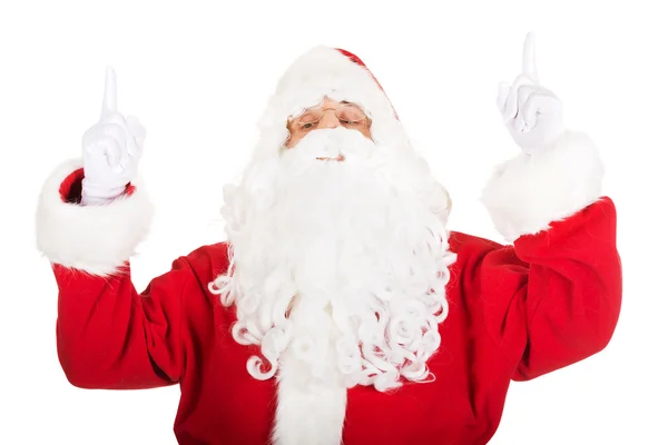 Santa Claus pekar händerna uppåt — Stockfoto