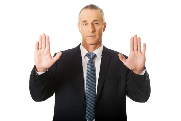 Businessman pressing an abstract touchscreen — Stock Photo, Image