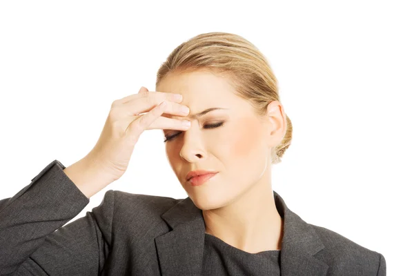 Woman with sinus pressure pain Stock Picture