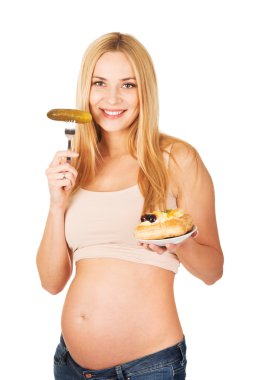孕妇吃皮刺和蛋糕pasta ve turşu ile mutlu hamile kadın