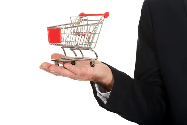 Close up man holding shopping cart — Stock Photo, Image