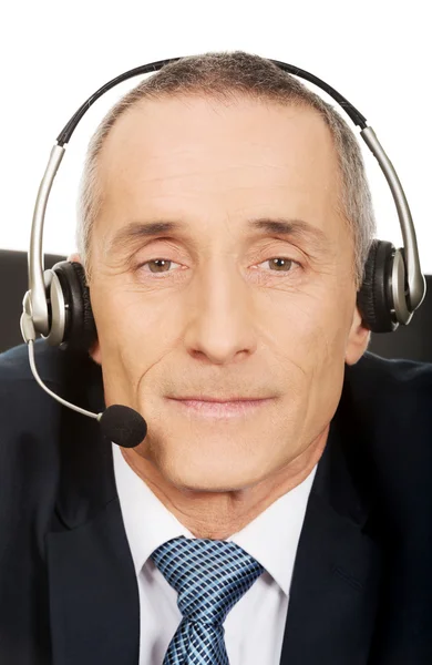 Portrait of call center man sitting in the office — Stock Photo, Image