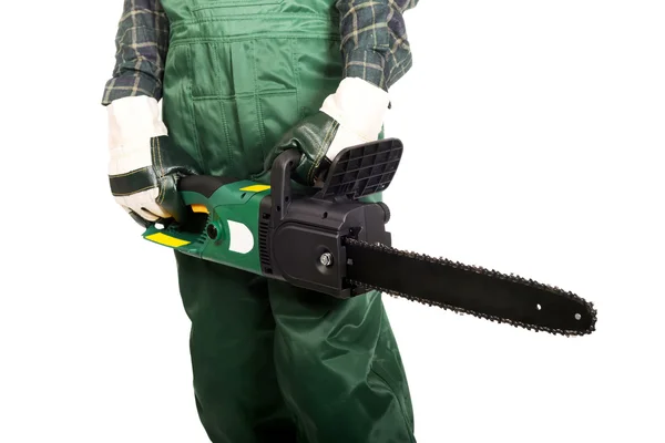 Gardener in uniform holding chainsaw — Stock Photo, Image